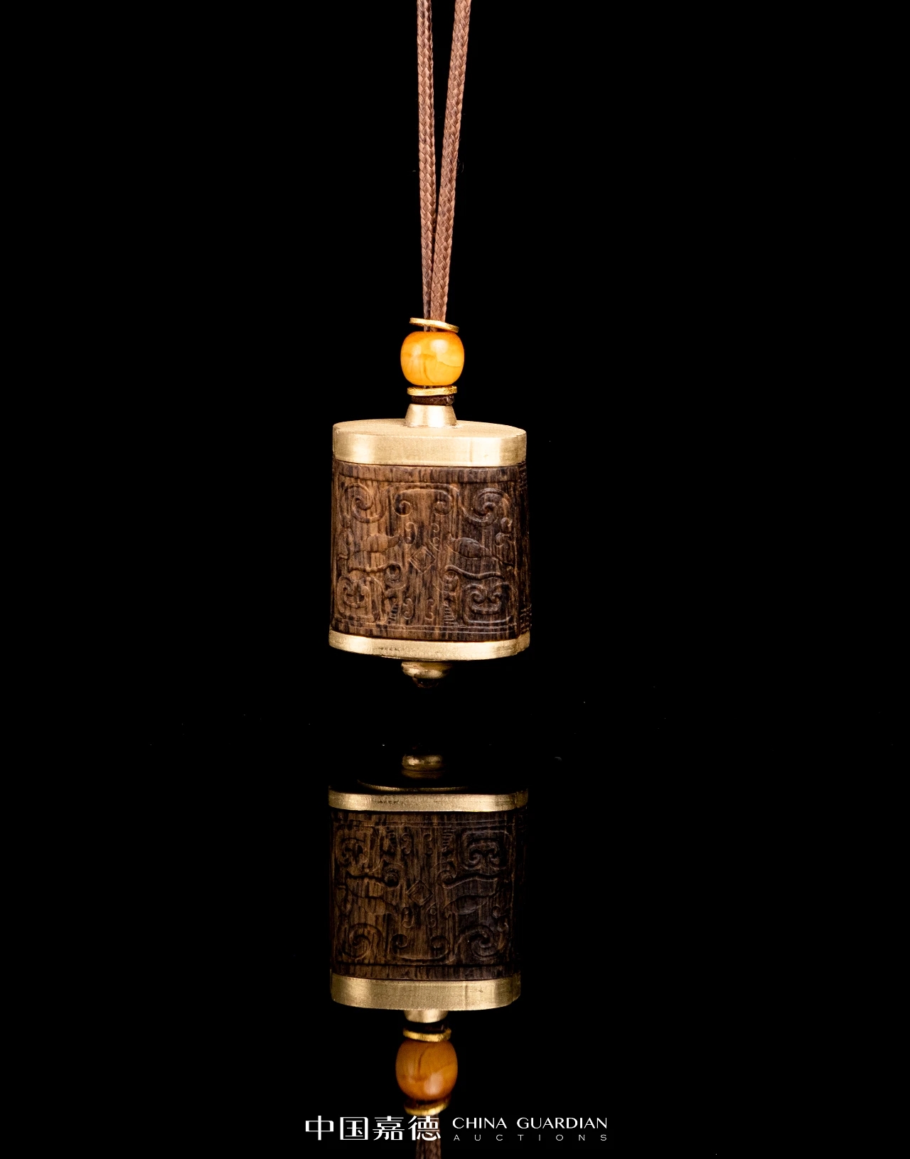 Carved pendant